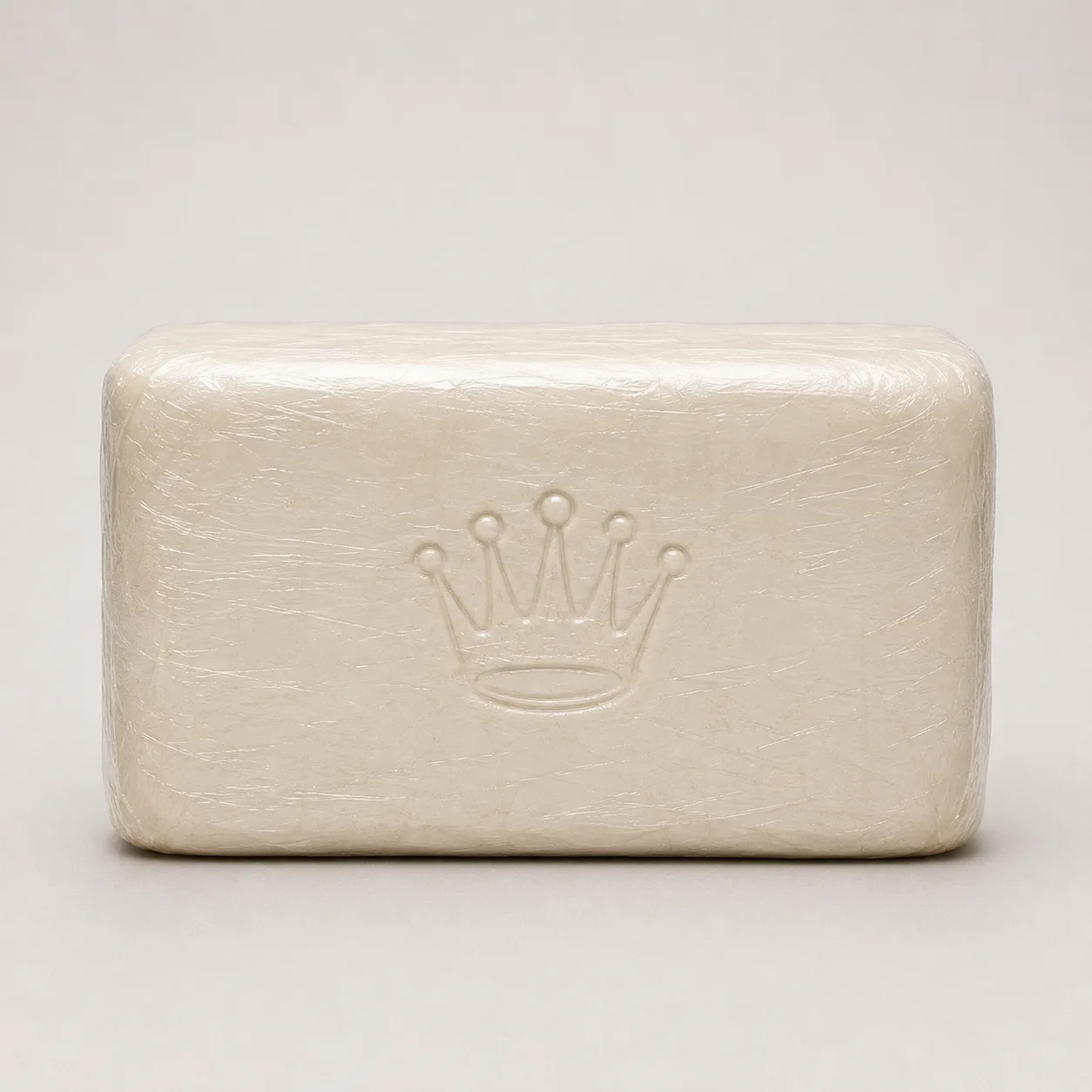 A kilogram block stamped with a crown and the word Prestige on a neutral background - the branded bricks described as cocaine in Madlanga Commission evidence.
